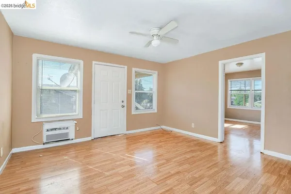 a kitchen with stainless steel appliances granite countertop a refrigerator sink and stove