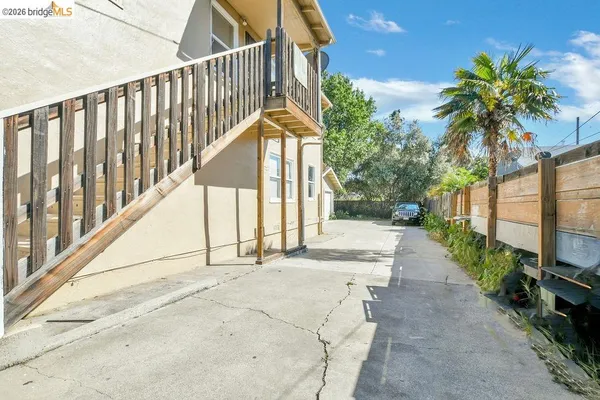 a view of a house with a street