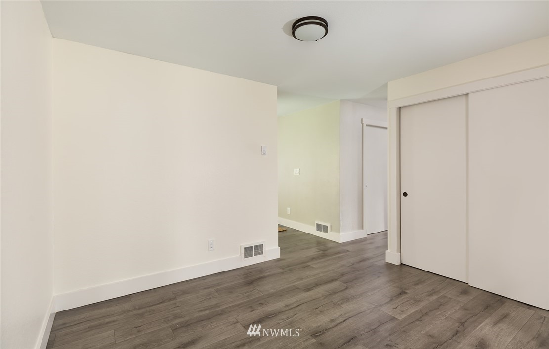 19129 Denmark Street Southwest Rochester, WA 98579 - Photo 8 of 21 a view of a room with wooden floor