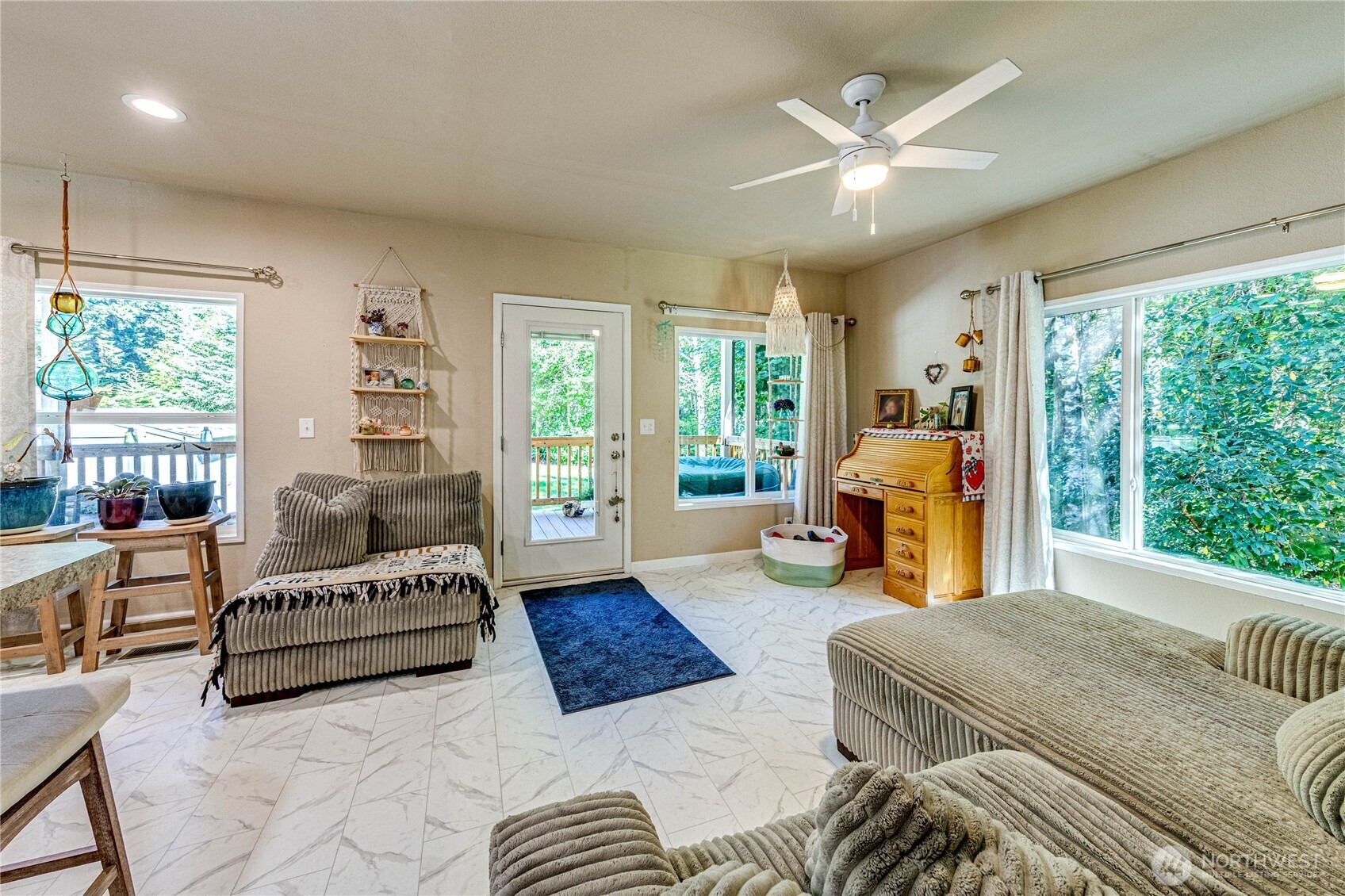 51 Sunflower Road Port Angeles, WA 98363 - Photo 12 of 40 a living room with furniture and a large window