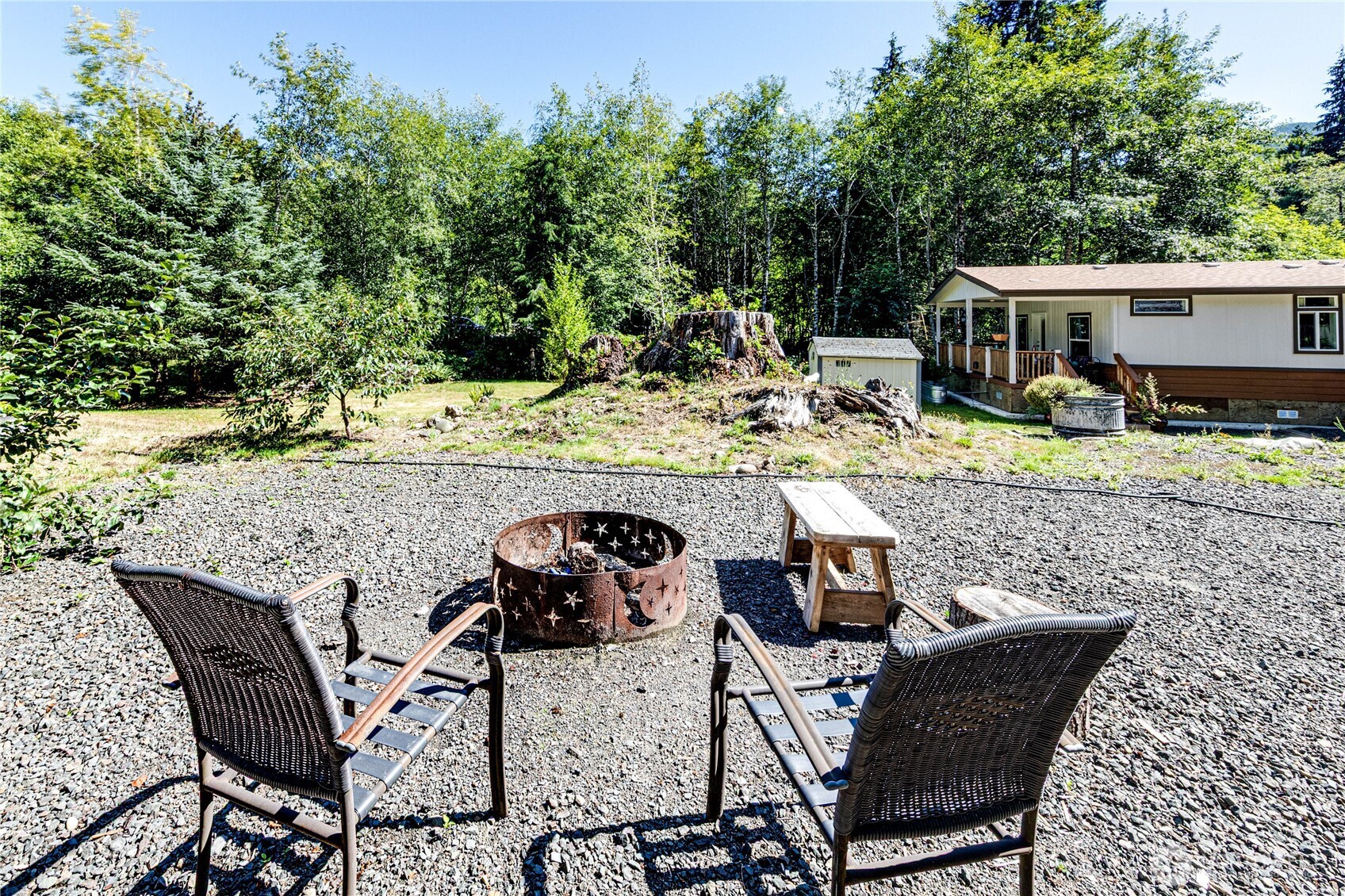 51 Sunflower Road Port Angeles, WA 98363 - Photo 26 of 40 a view of a chairs and table in patio