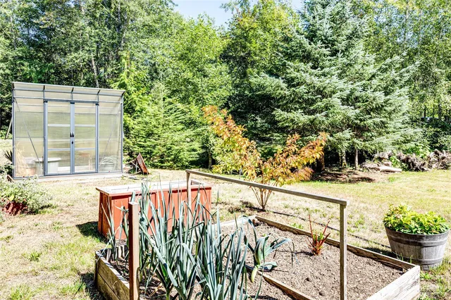 a view of a garden with patio