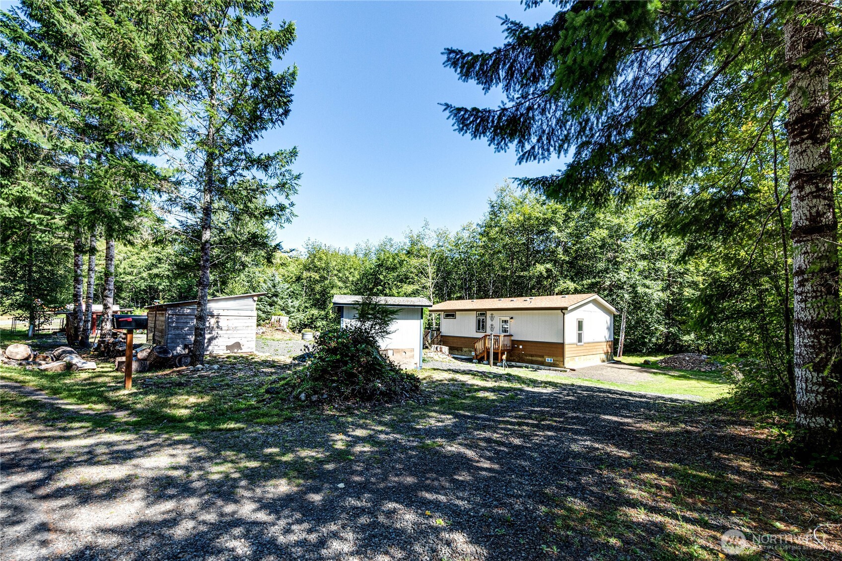 51 Sunflower Road Port Angeles, WA 98363 - Photo 7 of 40 a house view with a backyard space