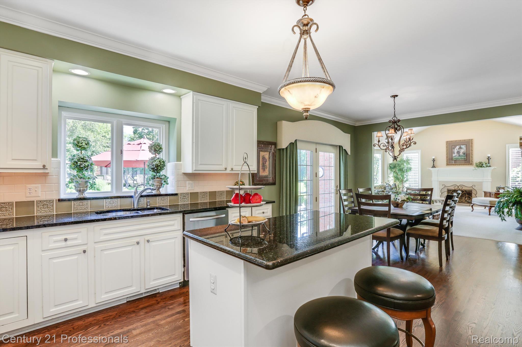 2104 Mapleridge Road Rochester, MI 48309 - Photo 16 of 65 Large kitchen island with overhang for barstools