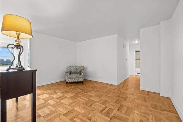 a view of a livingroom with wooden floor