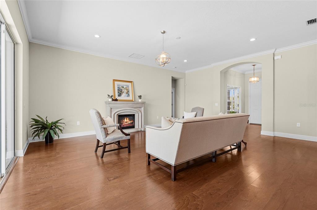 357 Marsh Creek Road Venice, FL 34292 - Photo 18 of 70 a living room with furniture and a table