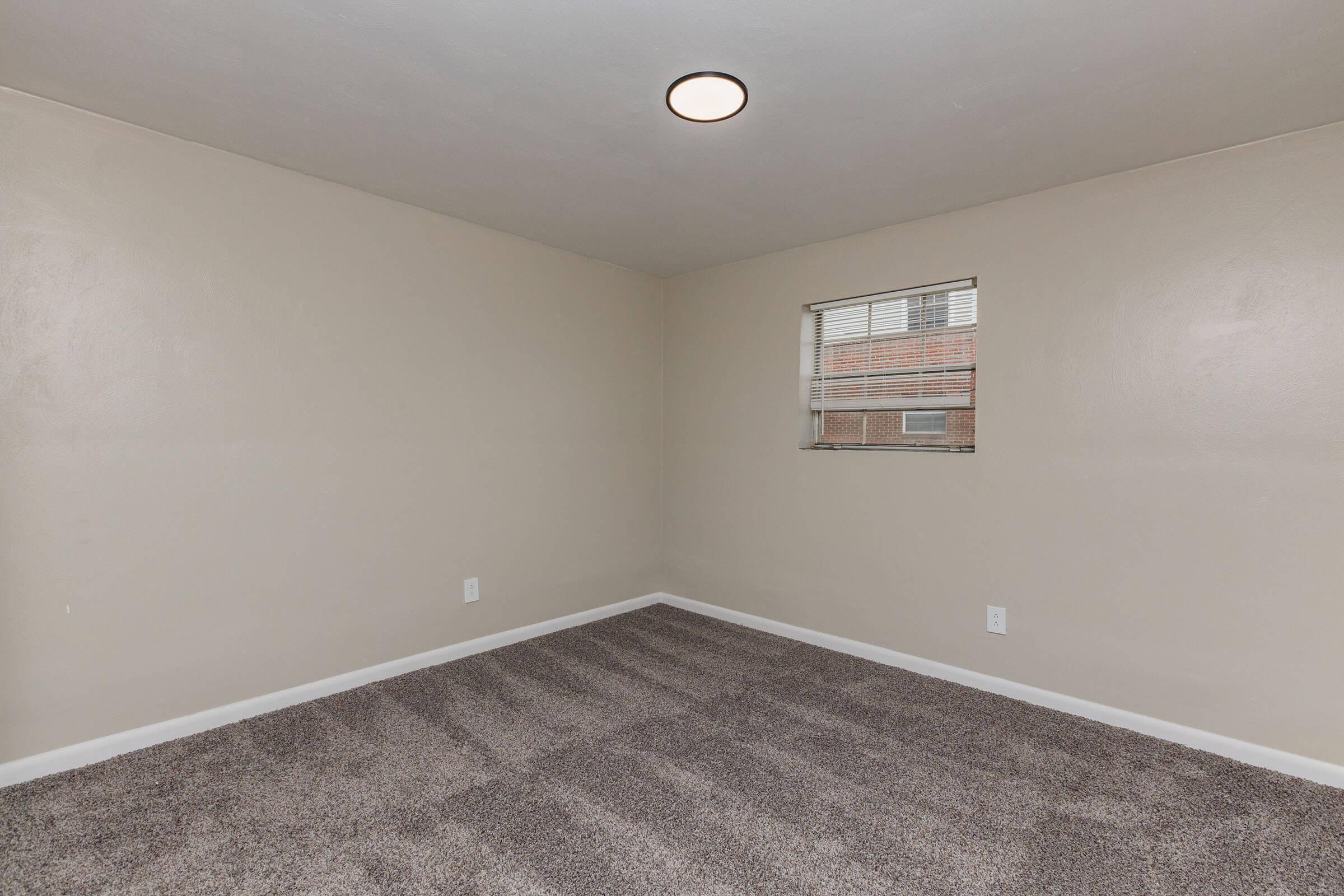 737 Townside Road Southwest, Unit 47 Roanoke, VA 24014 - Photo 21 of 22 an empty room with a workbench