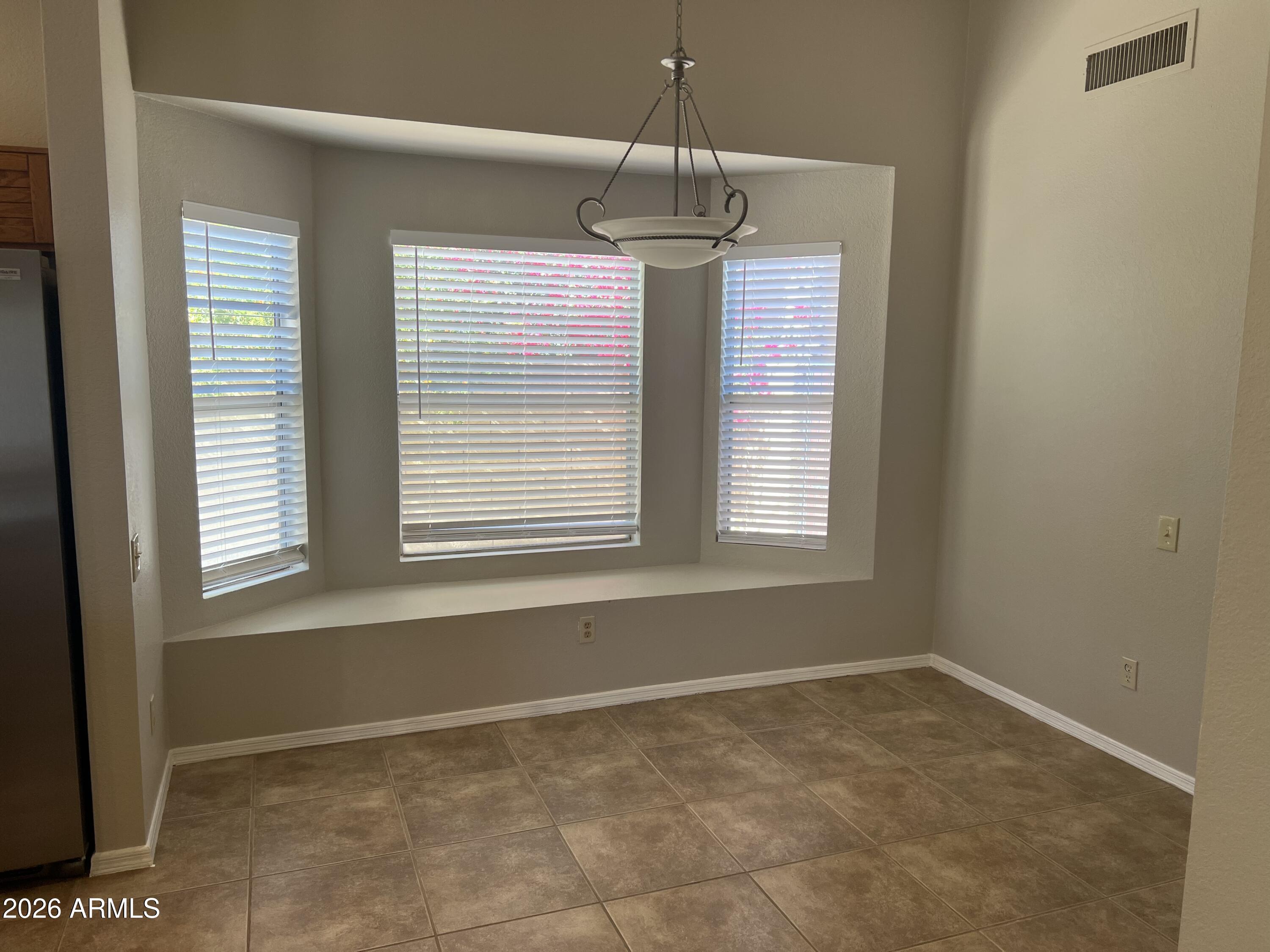 4819 West Butler Drive Chandler, AZ 85226 - Photo 6 of 12 dining room