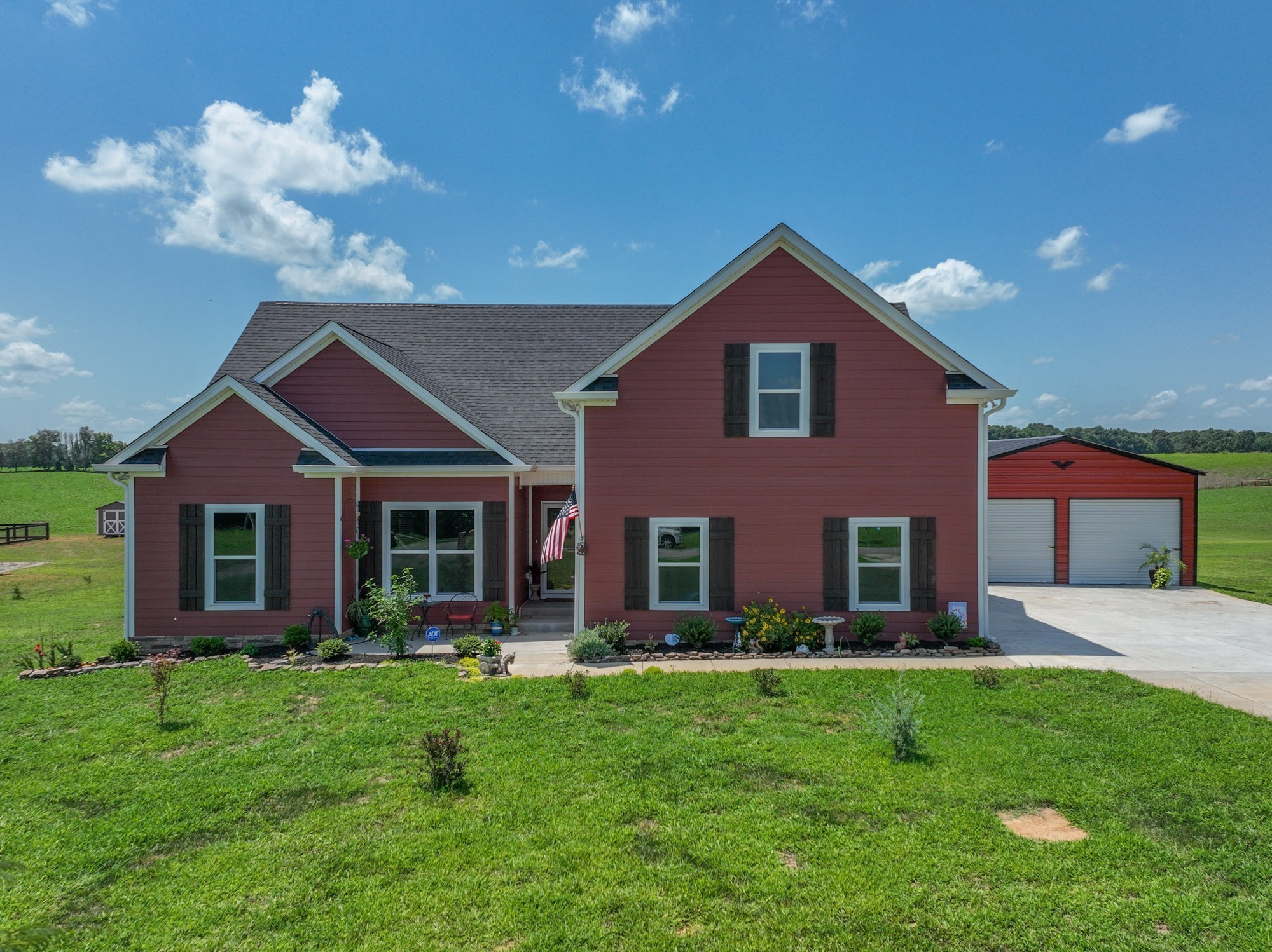4817 Barren Plains Road Springfield, TN 37172 - Photo 1 of 31 a front view of a house with a yard and garage