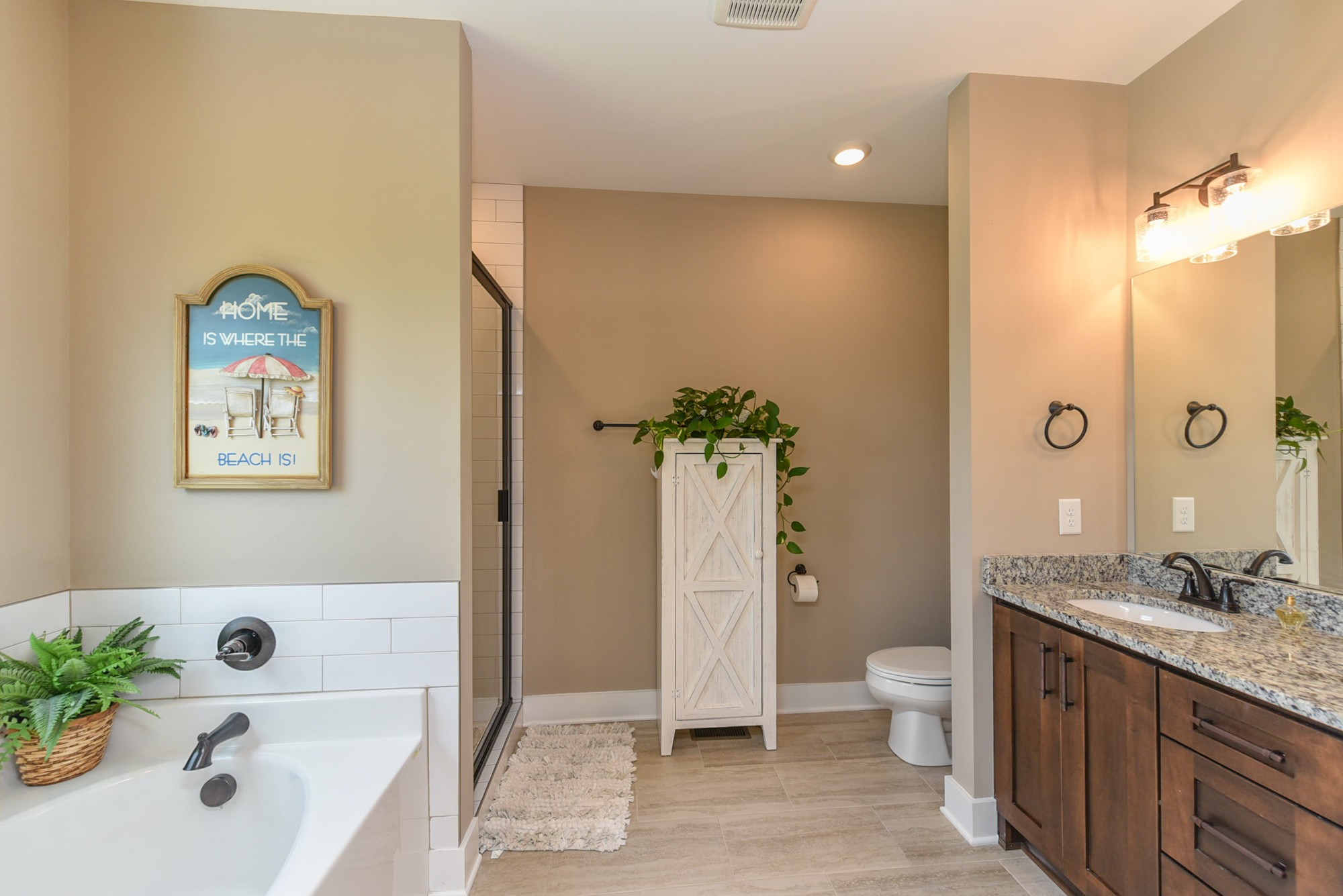 4817 Barren Plains Road Springfield, TN 37172 - Photo 13 of 31 a bathroom with a tub sink and mirror