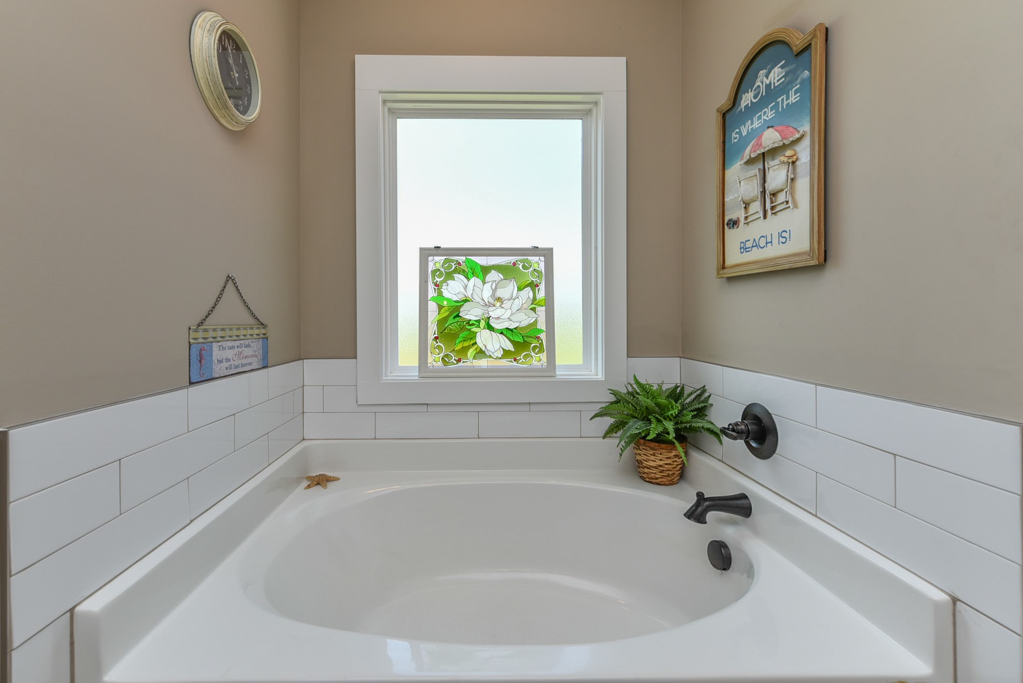 4817 Barren Plains Road Springfield, TN 37172 - Photo 14 of 31 a white bath tub with a window