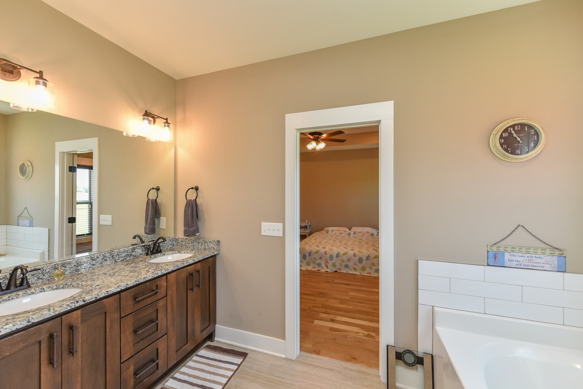 4817 Barren Plains Road Springfield, TN 37172 - Photo 16 of 31 a bathroom with a granite countertop sink and a mirror