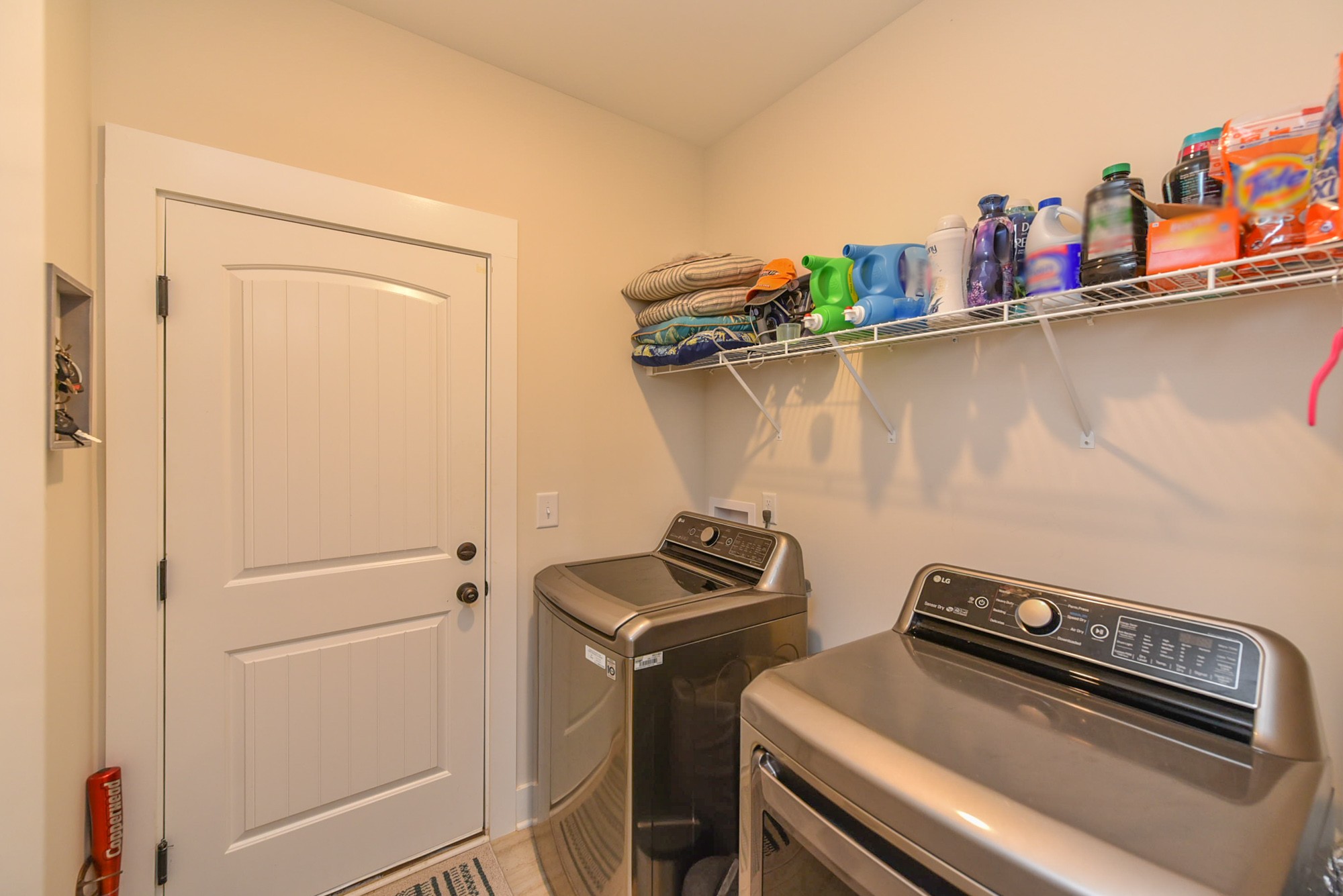 4817 Barren Plains Road Springfield, TN 37172 - Photo 22 of 31 a view of storage and utility room with racks on the wall