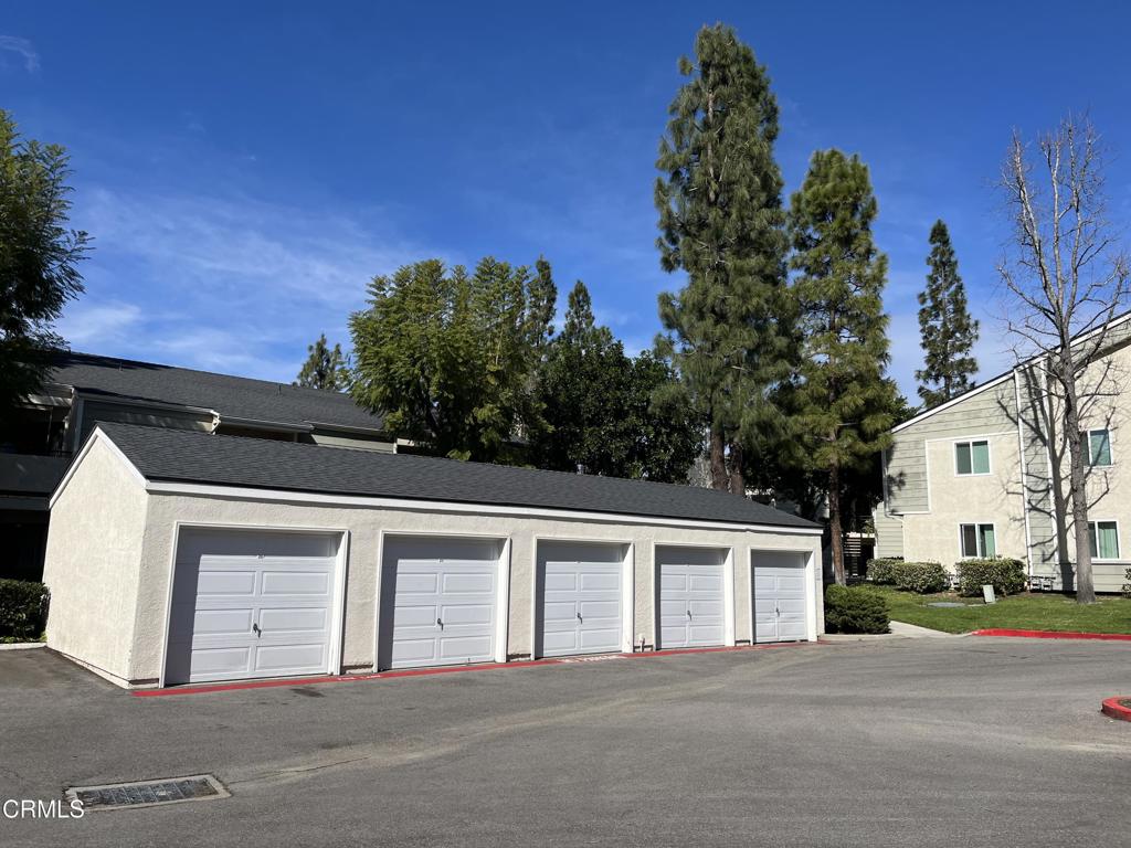 610-623 River Street Fillmore, CA 93015 - Photo 25 of 26 a front view of a house with a yard and garage
