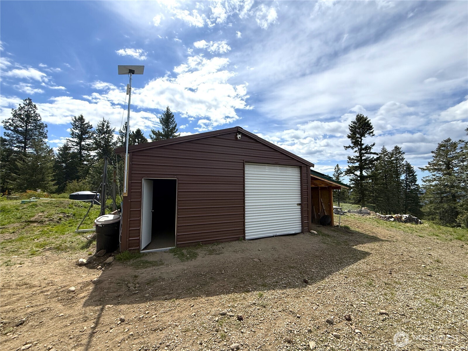 19 Union Ridge Spur Road Republic, WA 99166 - Photo 14 of 33 a view of a house with a yard and garage