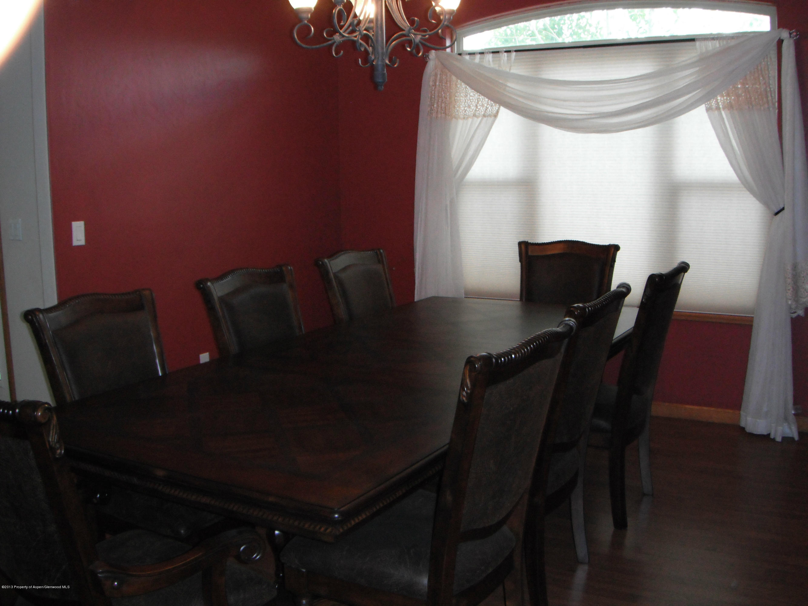1298 Fir Avenue Rifle, CO 81650 - Photo 11 of 27 a view of a dining room with furniture and window