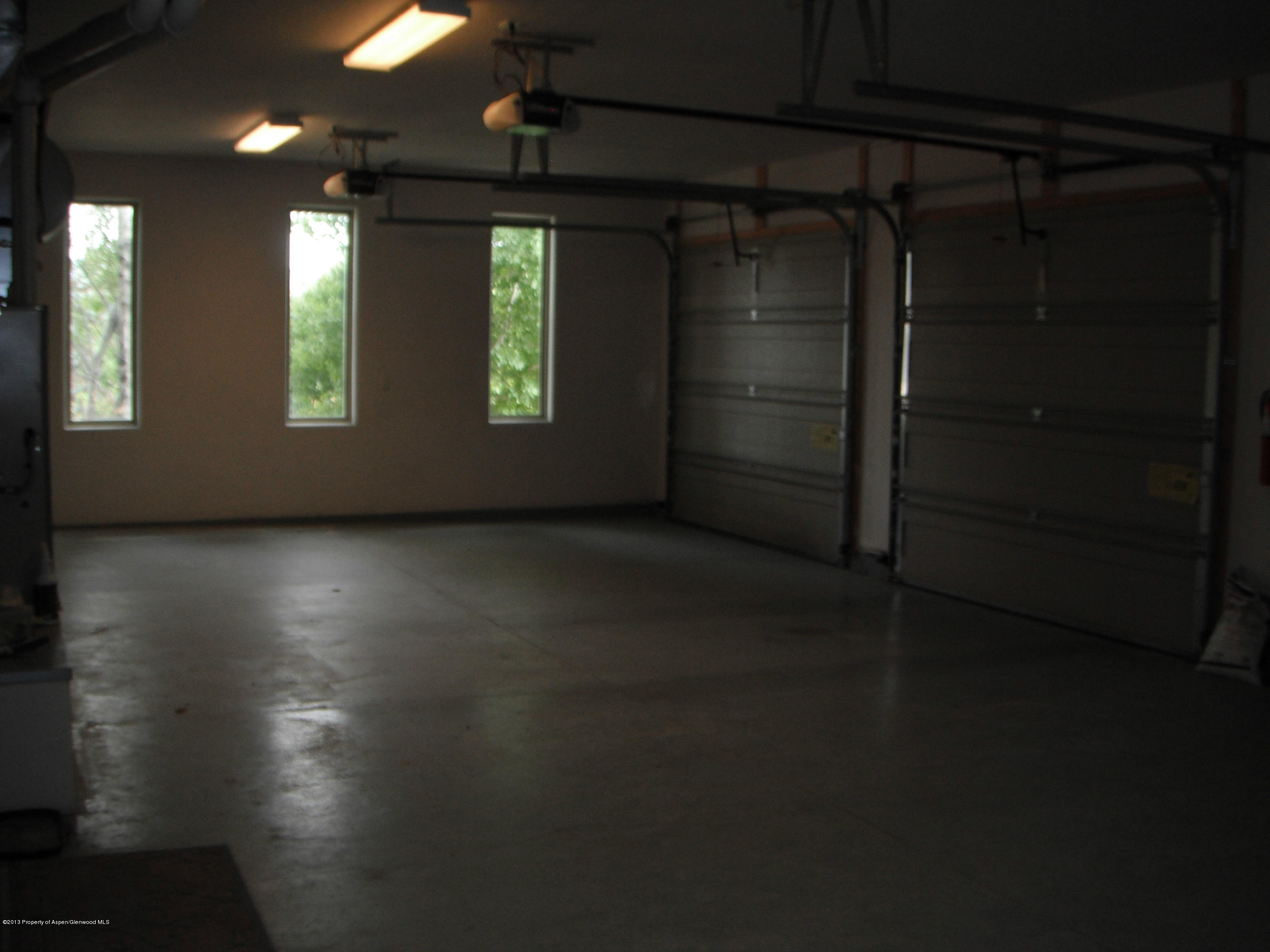 1298 Fir Avenue Rifle, CO 81650 - Photo 25 of 27 an empty room with windows