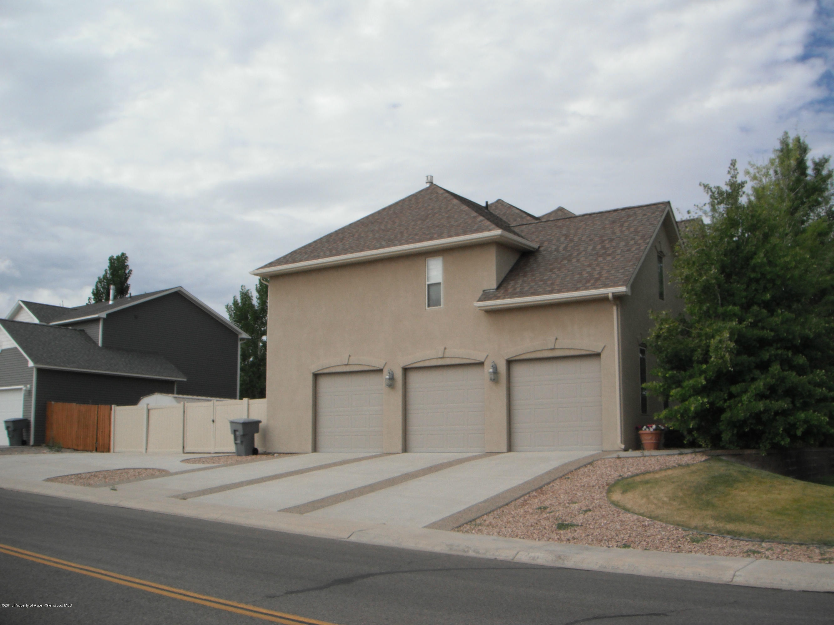 1298 Fir Avenue Rifle, CO 81650 - Photo 3 of 27 a view of street along with residential houses