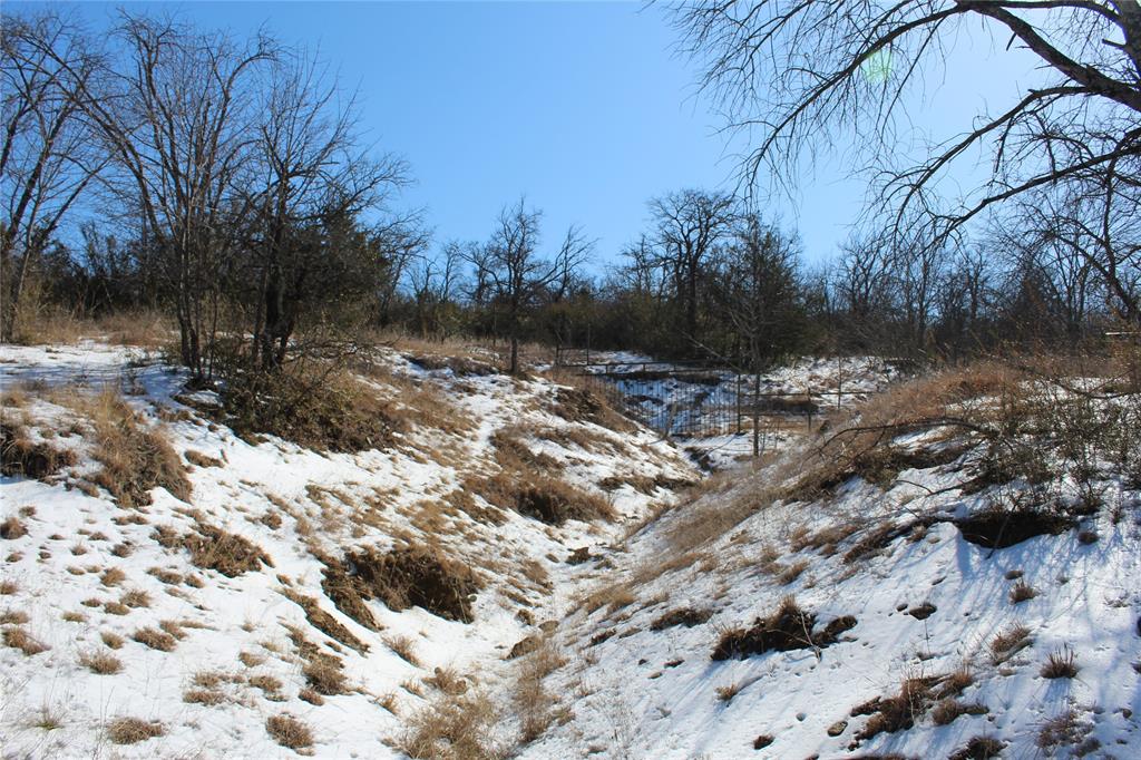 2585 Underwood Road Denton, TX 76207 - Photo 12 of 19 a view of a backyard of snow