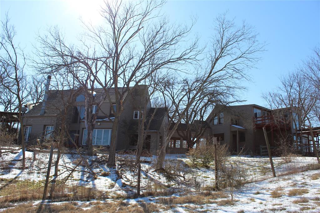 2585 Underwood Road Denton, TX 76207 - Photo 16 of 19 a view of a house with snow on the road