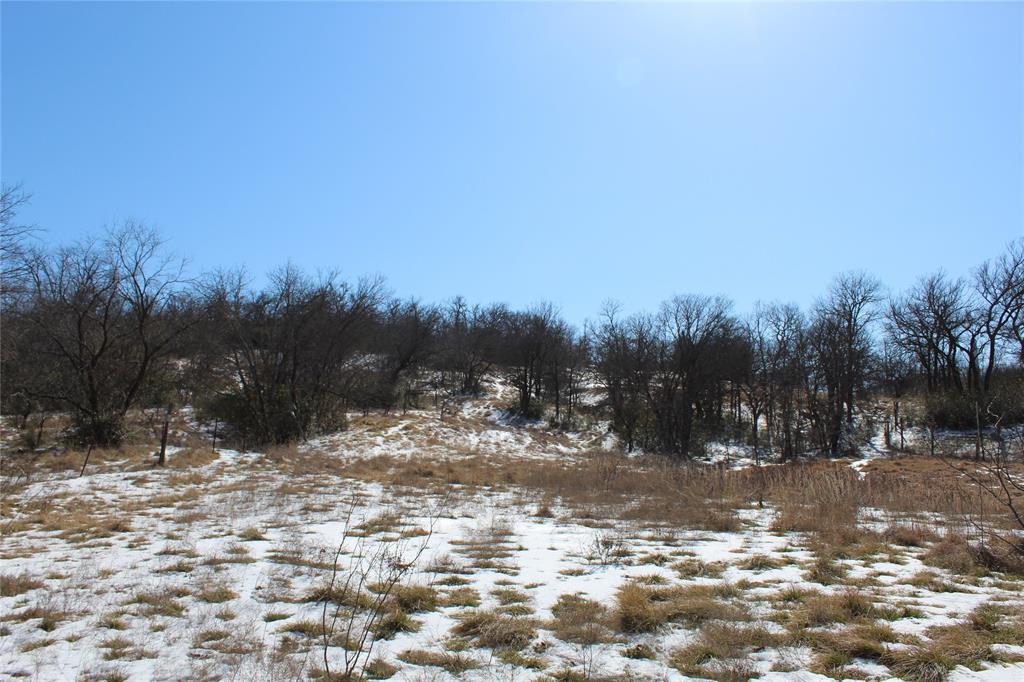 2585 Underwood Road Denton, TX 76207 - Photo 2 of 19 a view of a yard covered with snow