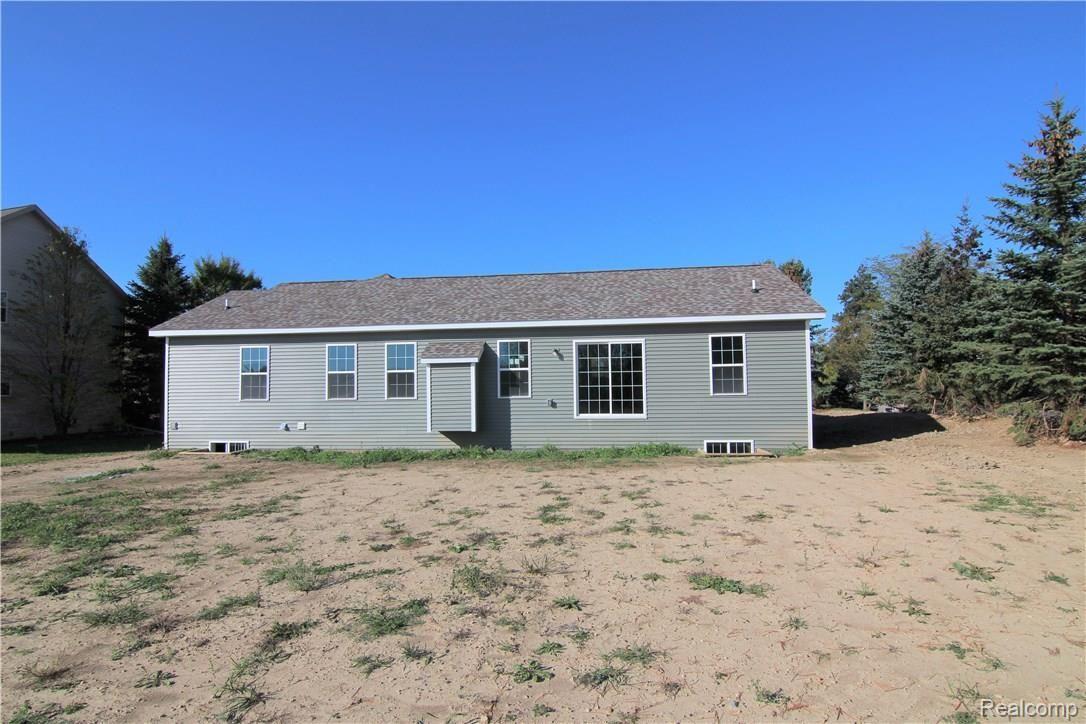 7440 Lahring Road Gaines, MI 48436 - Photo 11 of 12 13005 Alyssa Ct Back 1.JPG