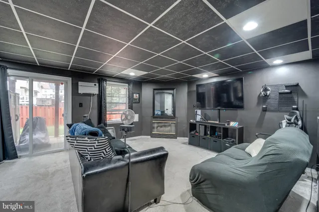 a living room with furniture and a table