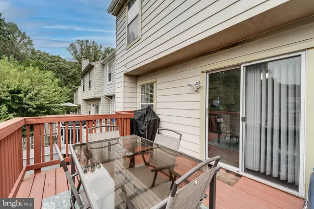 a front view of a house with entryway and stairs