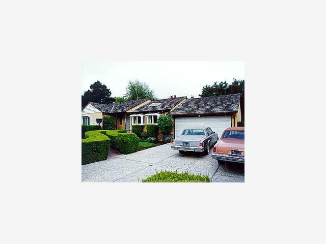 1046 Springer Road Los Altos, CA 94024 - Photo 1 of 1 a couple of cars parked in front of a house