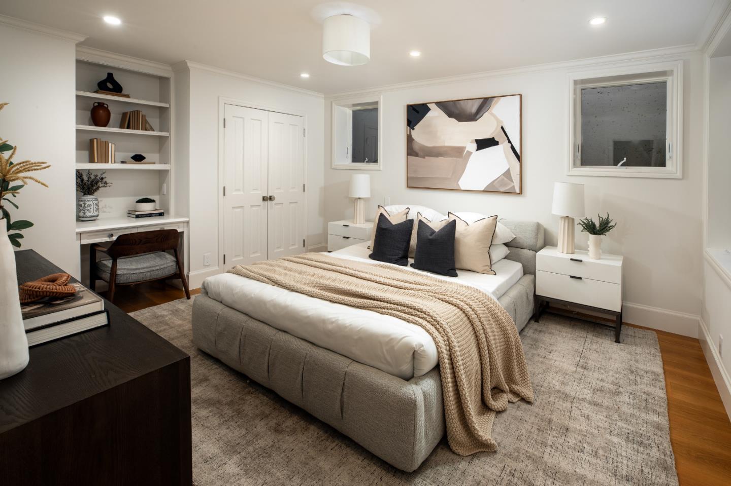 90 Macbain Avenue Atherton, CA 94027 - Photo 14 of 19 a bedroom with a bed and a book shelf