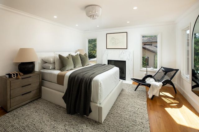 a bed room with a bed and a couch