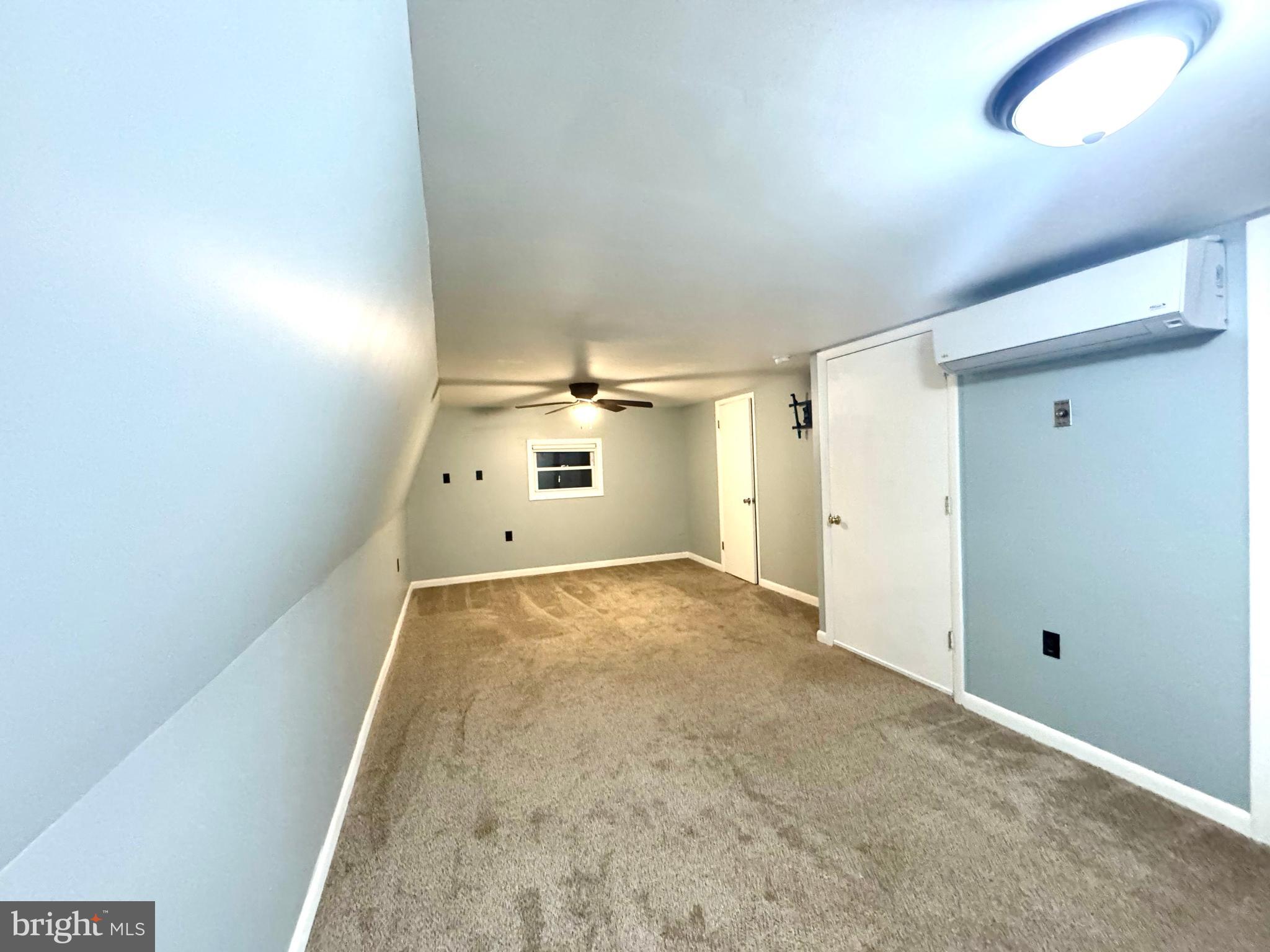 4695 Shelltown Road Marion Station, MD 21838 - Photo 21 of 31 en empty room with windows