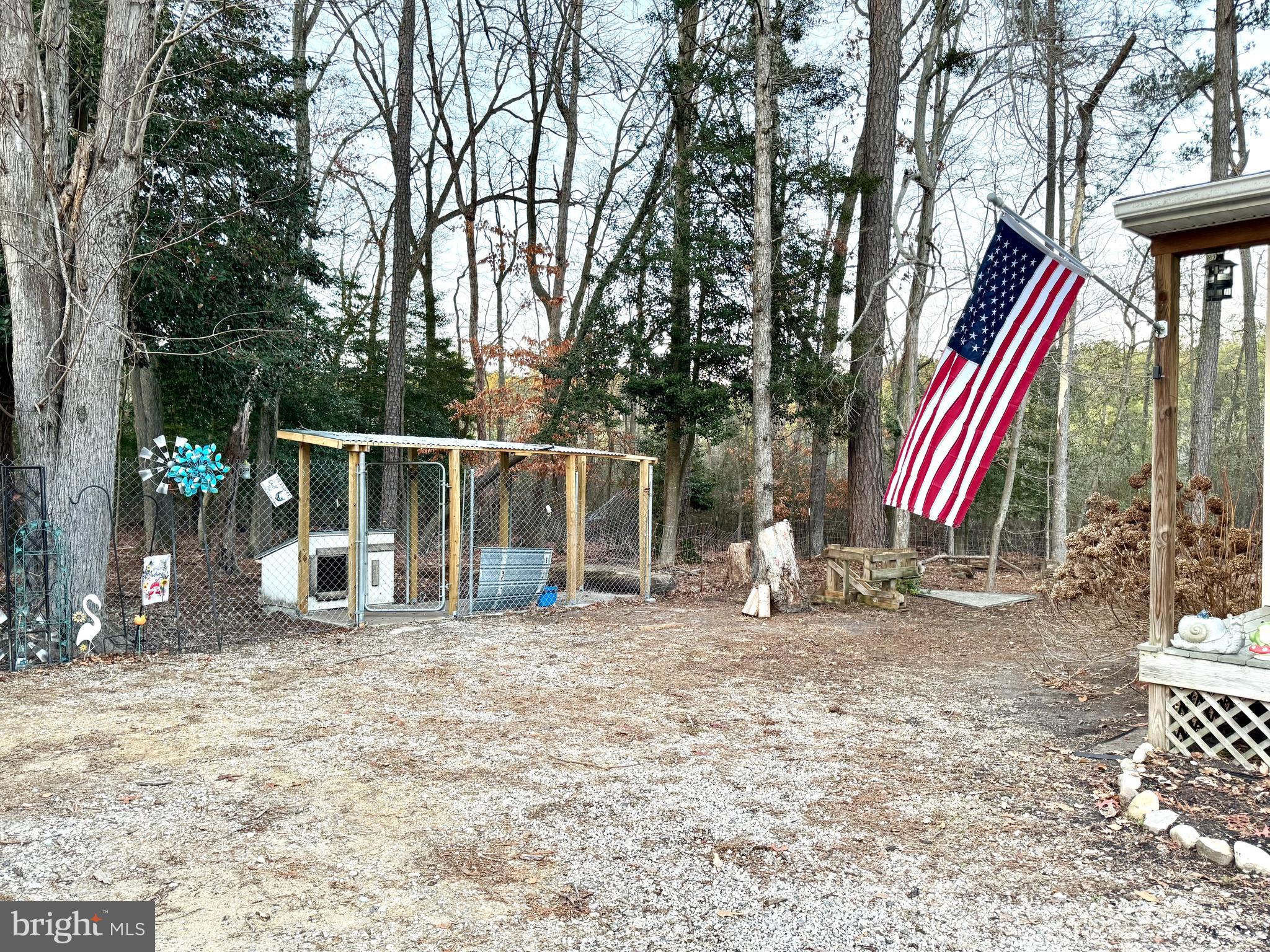 4695 Shelltown Road Marion Station, MD 21838 - Photo 30 of 31 a view of a house with backyard and sitting area