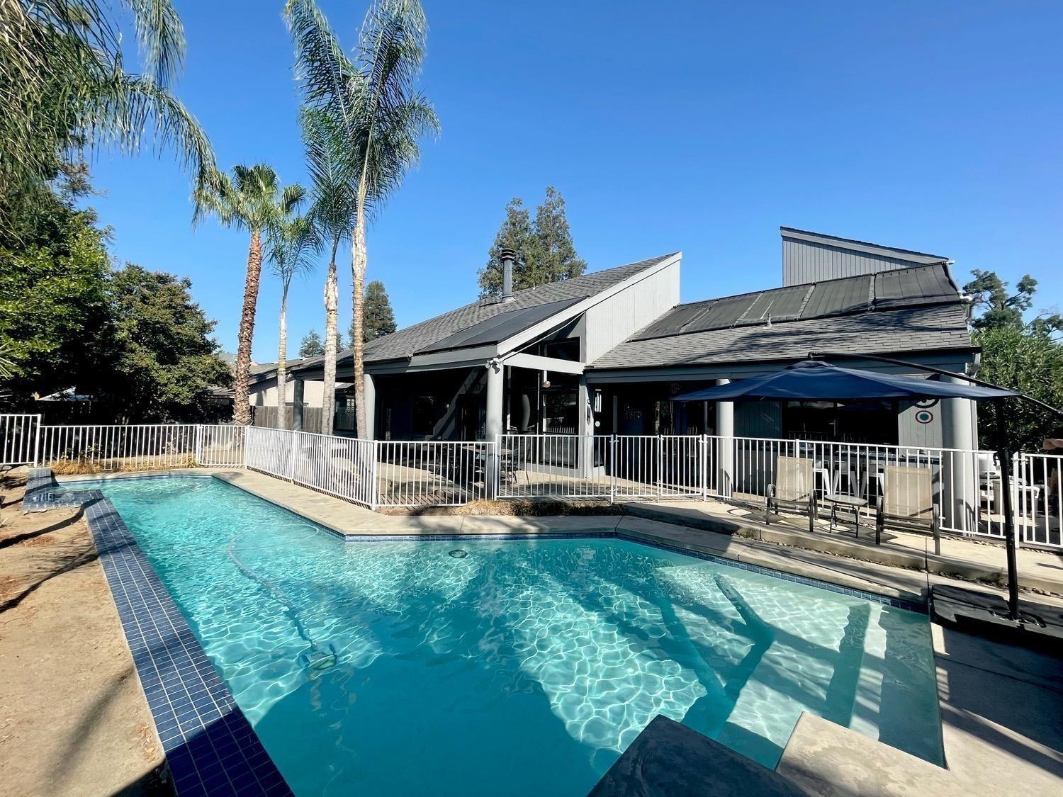 1956 Richert Avenue Clovis, CA 93611 - Photo 18 of 18 a view of a house with swimming pool and sitting area