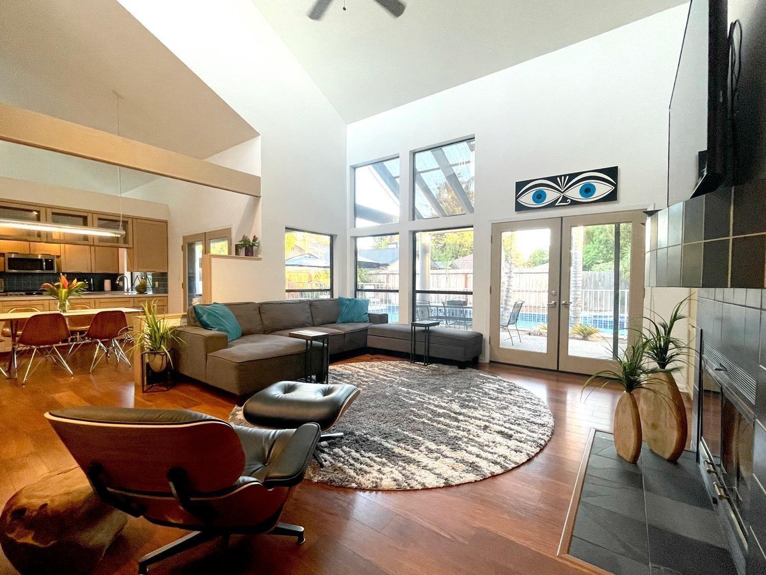 1956 Richert Avenue Clovis, CA 93611 - Photo 3 of 18 a living room with furniture fireplace and a flat screen tv