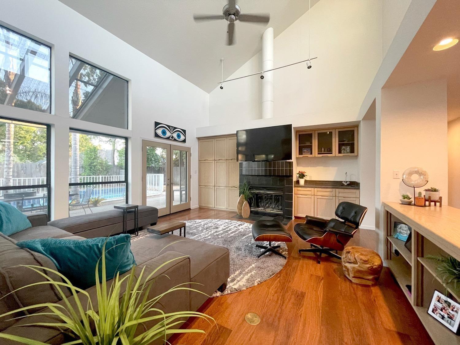 1956 Richert Avenue Clovis, CA 93611 - Photo 4 of 18 a bed room with a bed window and a television