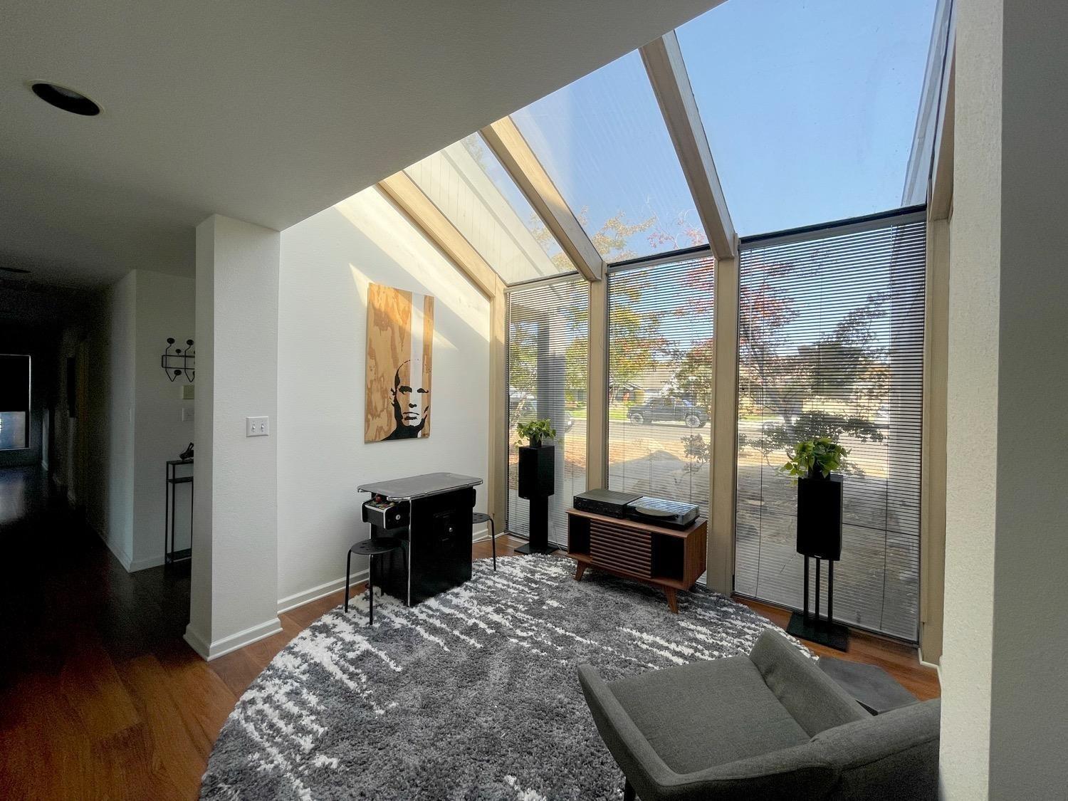 1956 Richert Avenue Clovis, CA 93611 - Photo 5 of 18 a bedroom with a bed and wooden floor