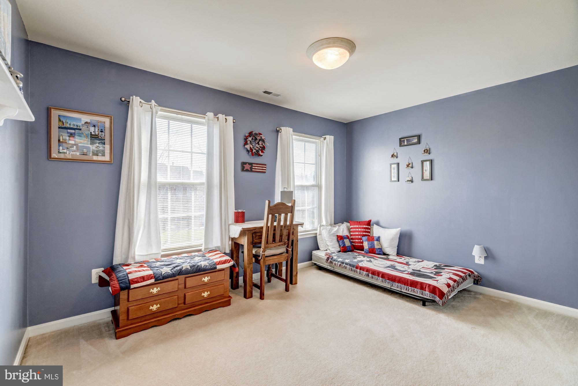 6092 Deer Ridge Trail Springfield, VA 22150 - Photo 19 of 30 a room with furniture and a window