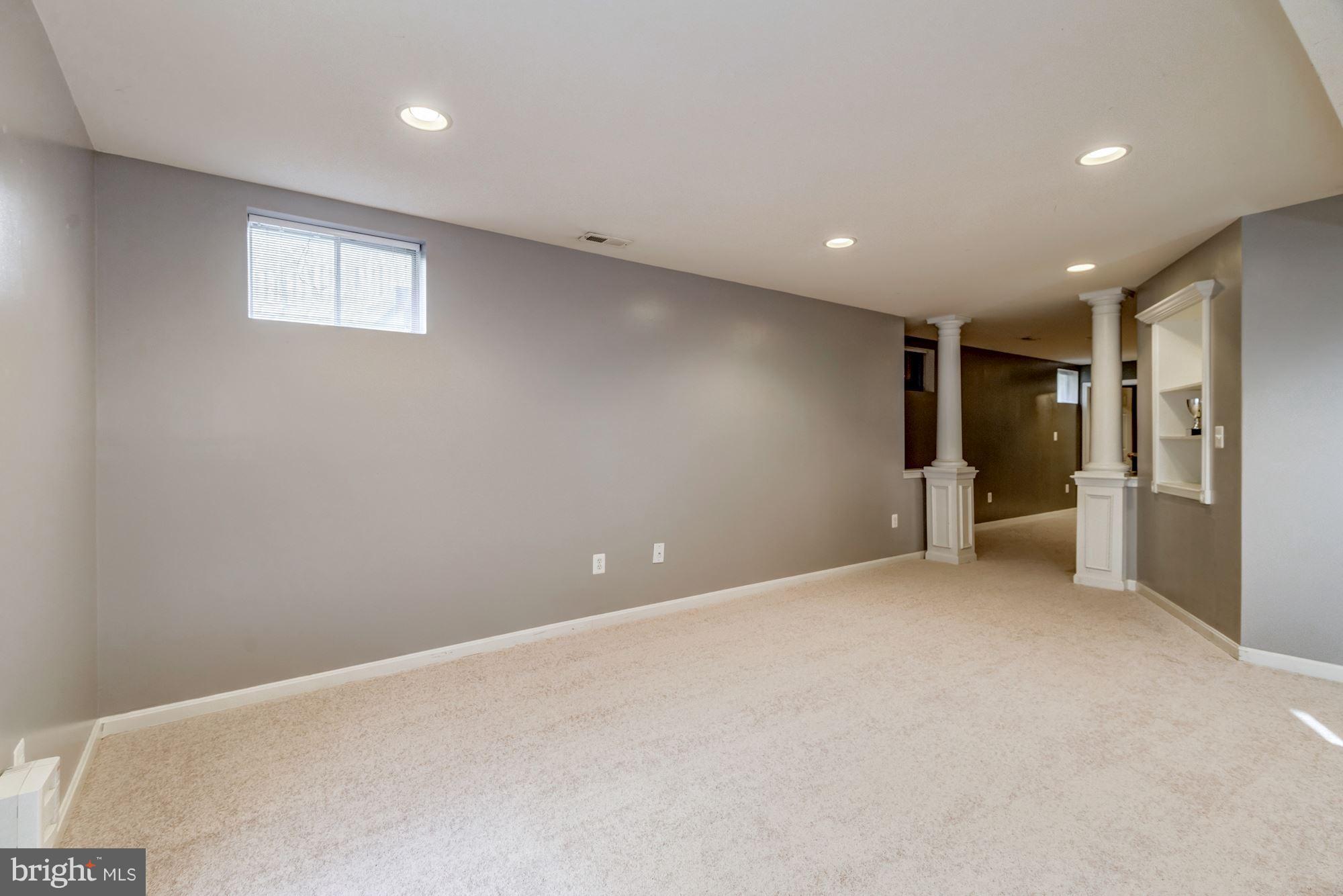 6092 Deer Ridge Trail Springfield, VA 22150 - Photo 23 of 30 a view of an empty room with a window