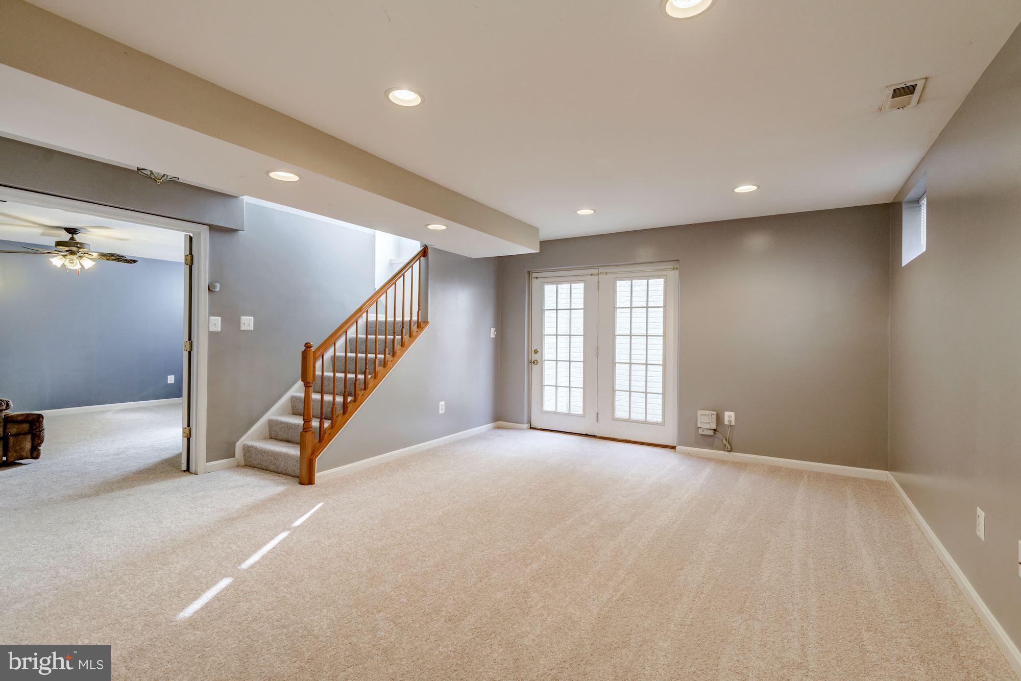 6092 Deer Ridge Trail Springfield, VA 22150 - Photo 24 of 30 a view of an empty room with stairs