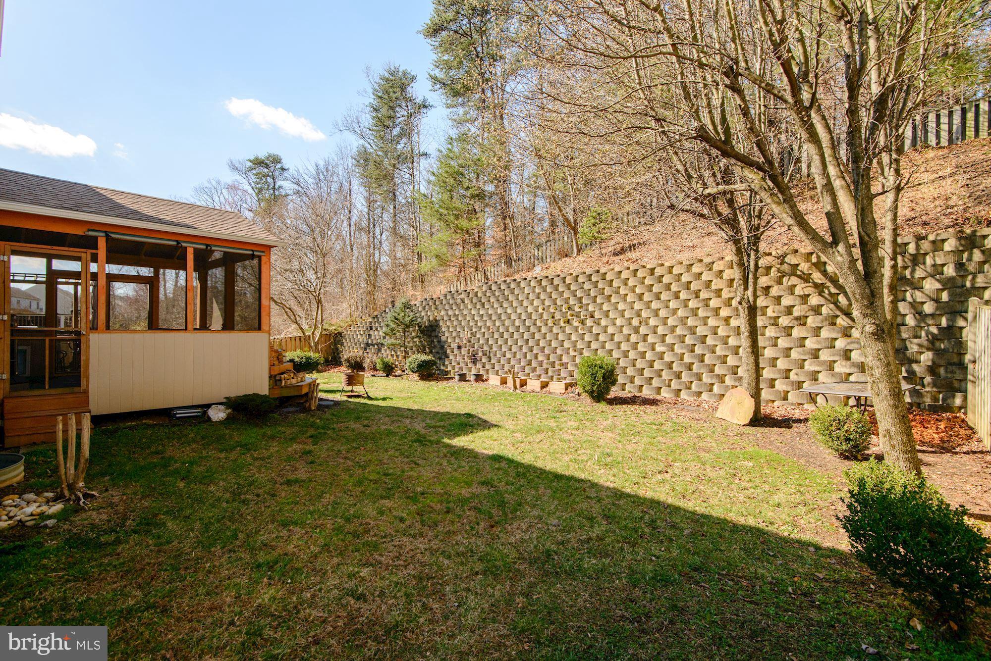 6092 Deer Ridge Trail Springfield, VA 22150 - Photo 29 of 30 a view of a house with backyard and sitting area