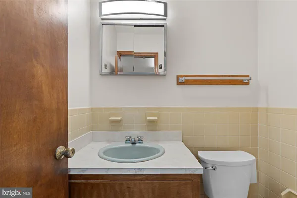 a bathroom with a sink and a toilet