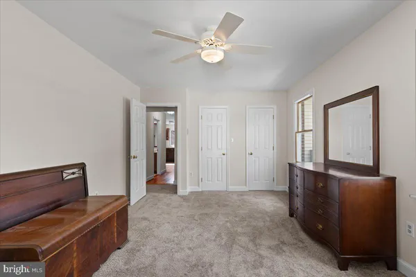 a view of room with window and cabinet