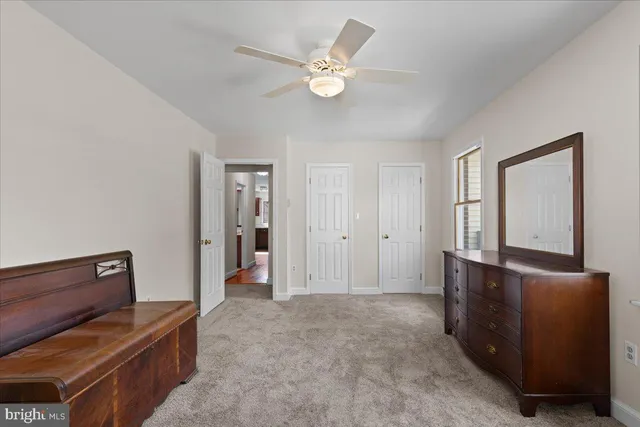 a view of room with window and cabinet