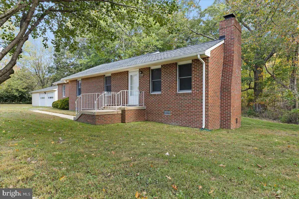 a house view with a garden space
