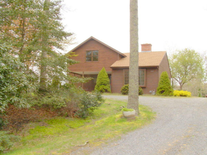 240 Oak Street West Barnstable, MA 02668 - Photo 19 of 19 a view of a house with a small yard and plants