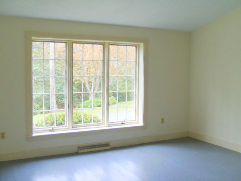 240 Oak Street West Barnstable, MA 02668 - Photo 6 of 19 a view of an empty room with a window