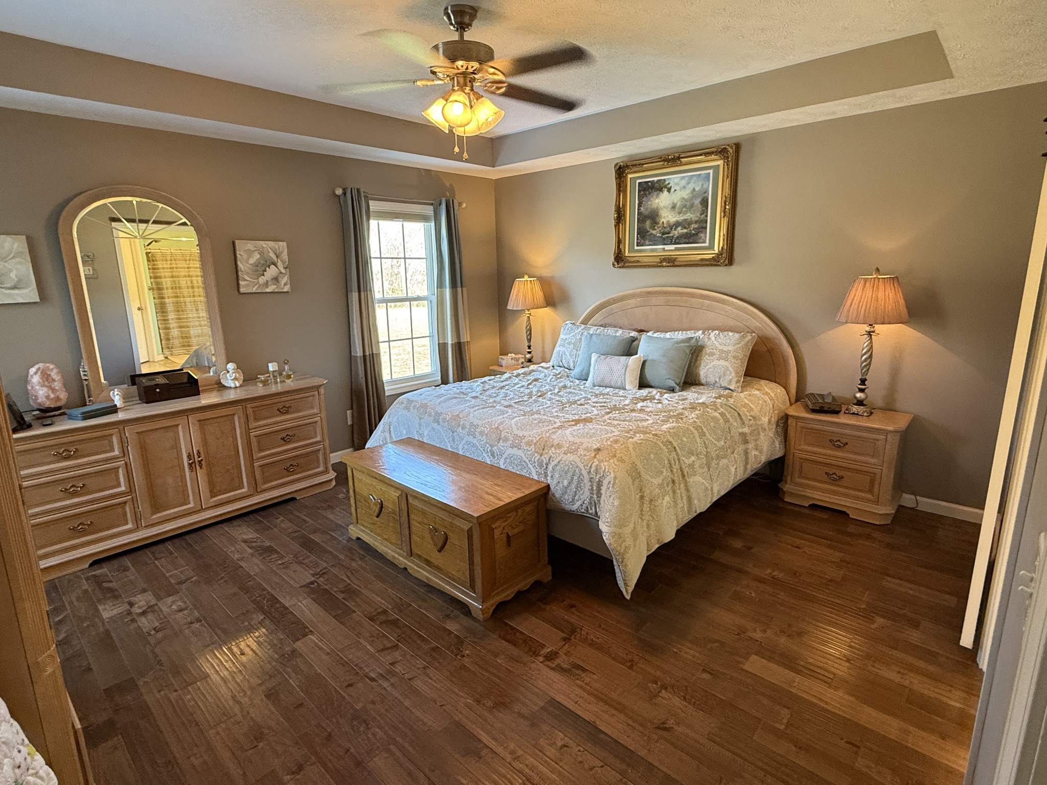 334 North Centerpoint Road Portland, TN 37148 - Photo 16 of 43 a bedroom with a bed a dresser and mirror