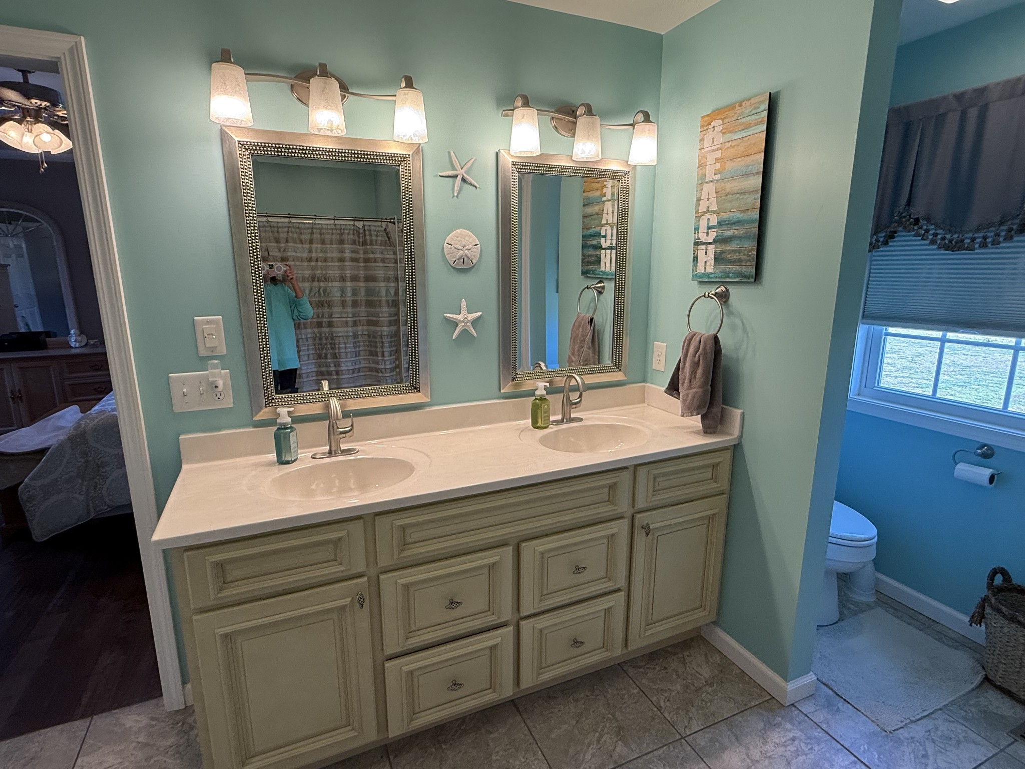 334 North Centerpoint Road Portland, TN 37148 - Photo 20 of 43 a bathroom with a double vanity sink and a mirror