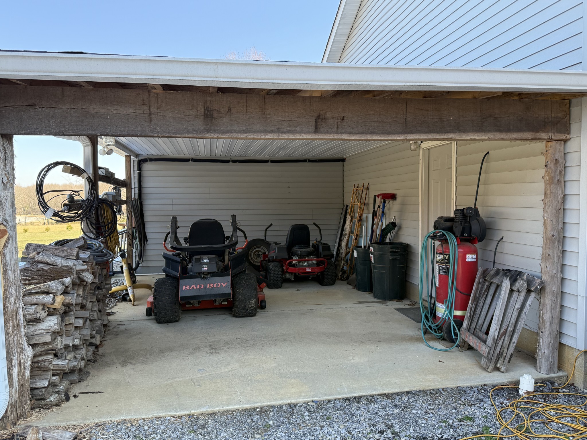 334 North Centerpoint Road Portland, TN 37148 - Photo 27 of 43 a view of a garage with parked cars